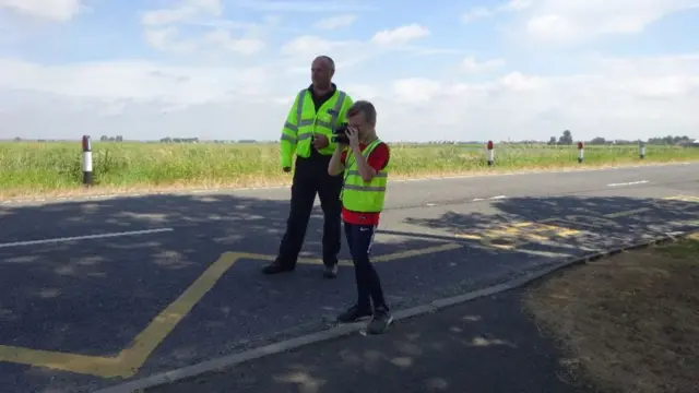 school kid with speed cameras