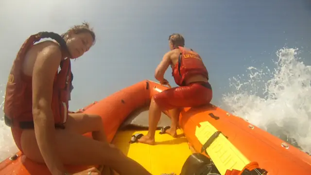 Lifeguards on rescue boat