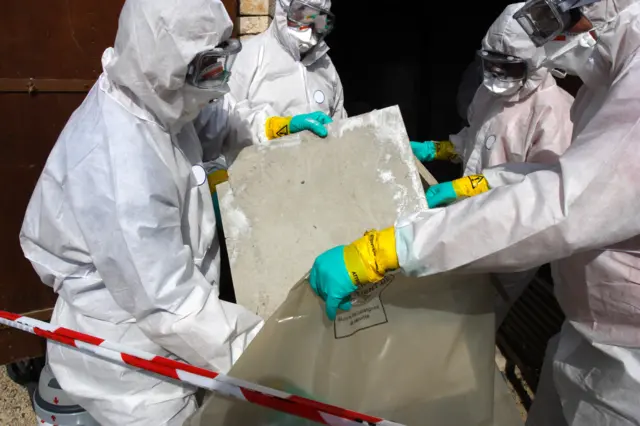 Asbestos removal team