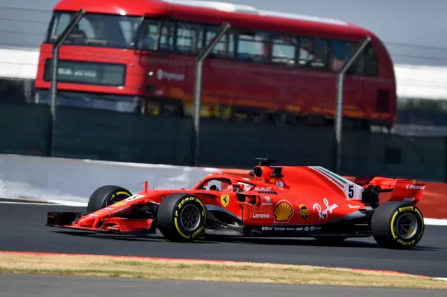 Vettel and red bus