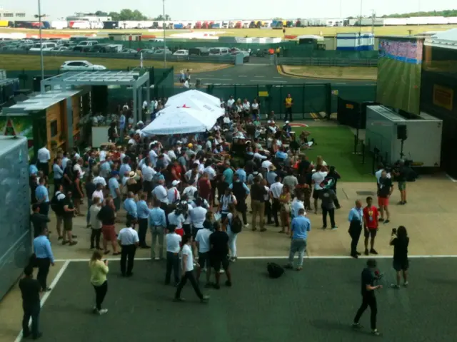 Fans watch football at Silverstone
