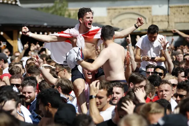 England fans celebrating Harry Maguire's goal