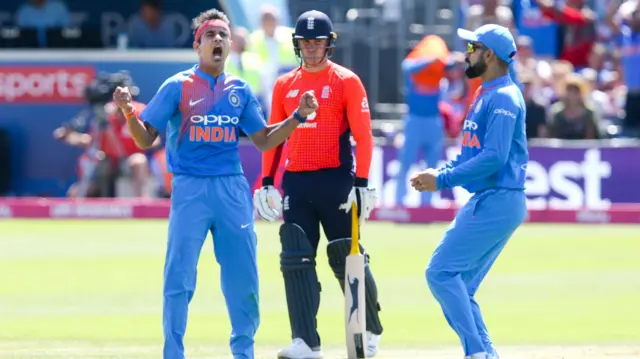 Siddarth Kaul celebrates the wicket of Jos Buttler (wk) of England bowled for 34 runs