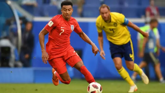 England's Jesse Lingard starts an attack against Sweden