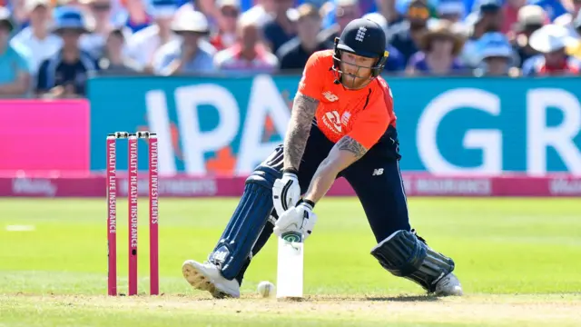 Ben Stokes scoops for four