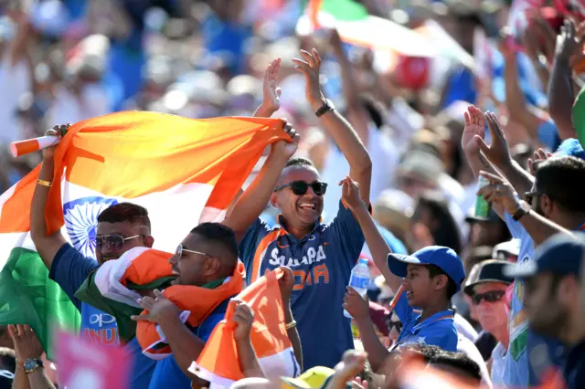 India fans celebrate a boundary