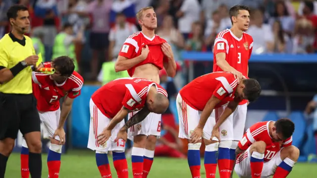 The Russia players look dejected after losing their World Cup quarter-final on penalties to Croatia