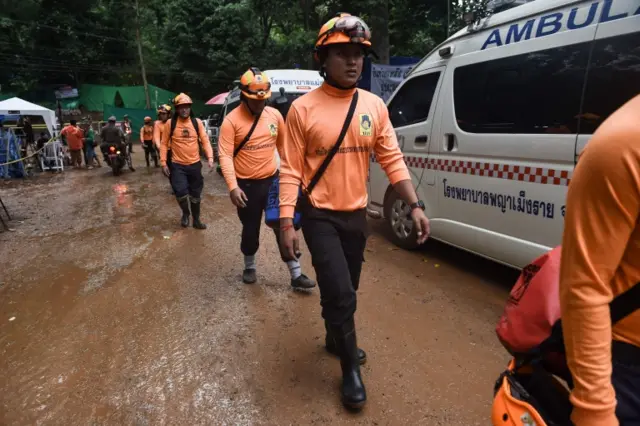 Rescue workers at the Tham Luang cave area