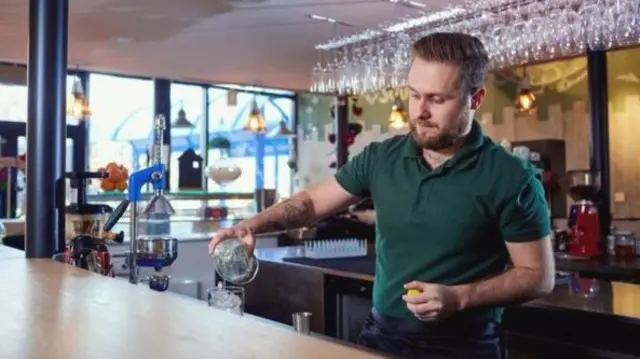 A worker in a Scottish bar