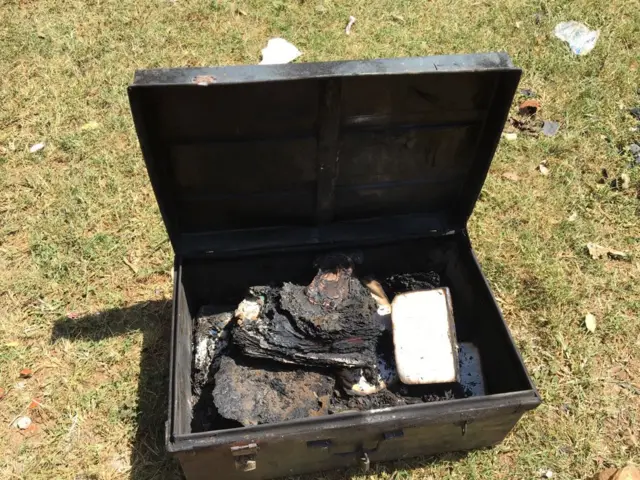 Burnt suitcase