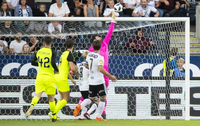 Craig Gordon tips over Marius Lundemo's header