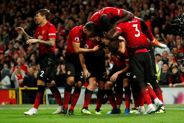 United celebrate Luke Shaw's goal