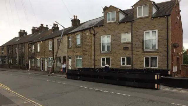 The lorry load near the house