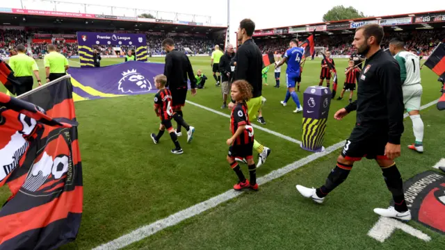 Players walk out at the Vitality Stadium