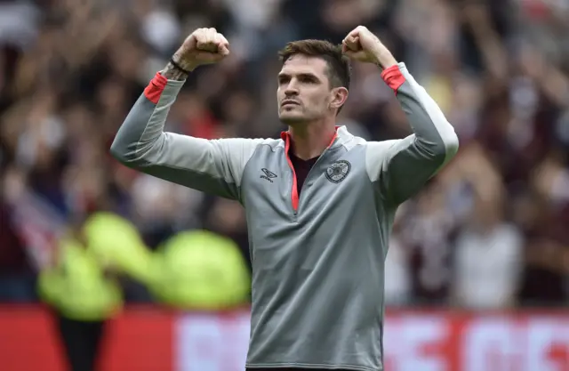 Kyle Lafferty celebrates Hearts' win over Celtic at full-time