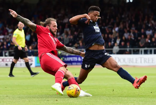 Aberdeen's Stevie May (left) and Nathan Ralph in action.