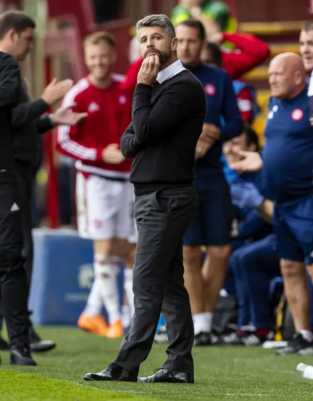 Motherwell boss Stephen Robinson watches his side lose to Hamilton