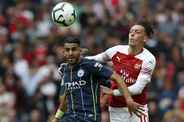 Ryiad Mahrez and Mesut Ozil