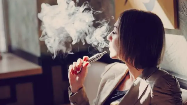 Vaping woman