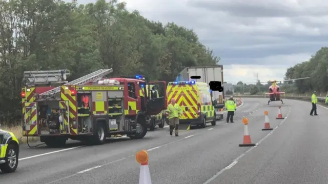 Scene of crash with air ambulance on motorway