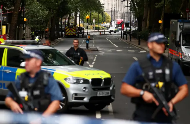 Armed police outside Westminster