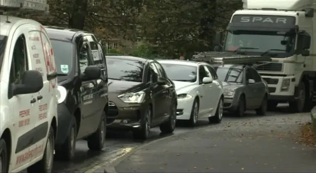 Cars waiting at a traffic light