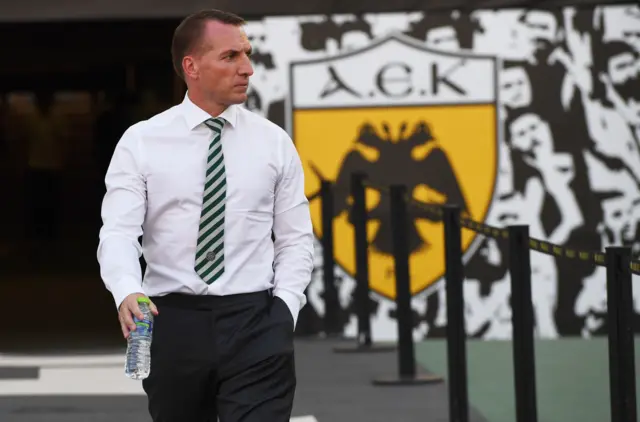 Celtic manager Brendan Rodgers takes an early walk on to the pitch at the Olympic Stadium