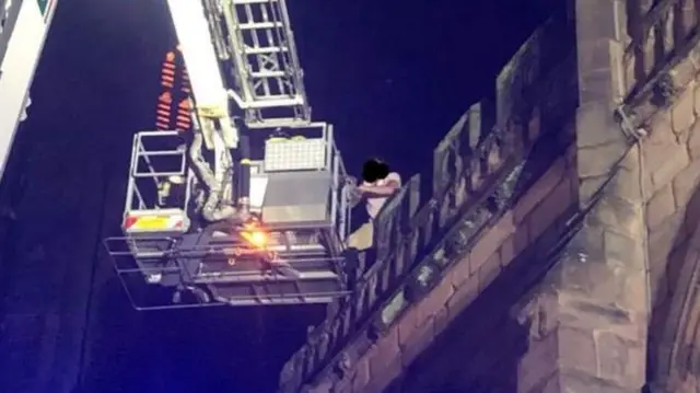 Two men were brought down from the top of the Coventry Cathedral