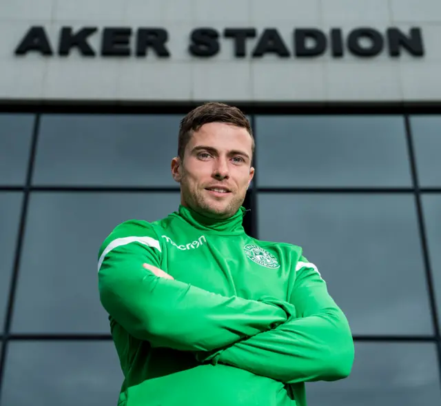 Hibs full-back Lewis Stevenson posing outside the Aker Stadium on Wednesday