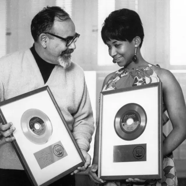 Singer Aretha Franklin and producer Jerry Wexler receive their gold records for their hit single 'I Never Loved A Man (The Way I Love You