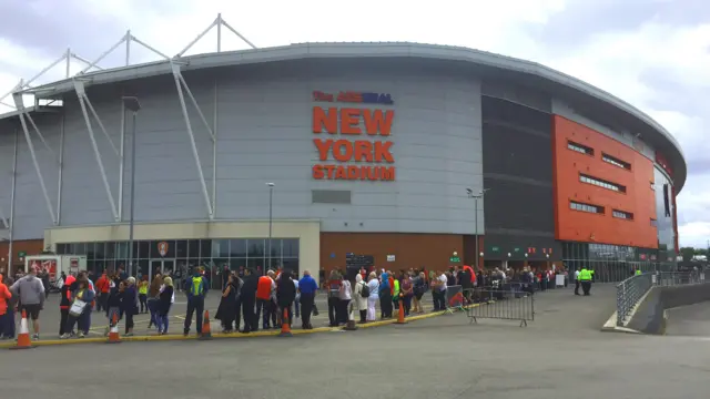 Fans outside the New York Stadium