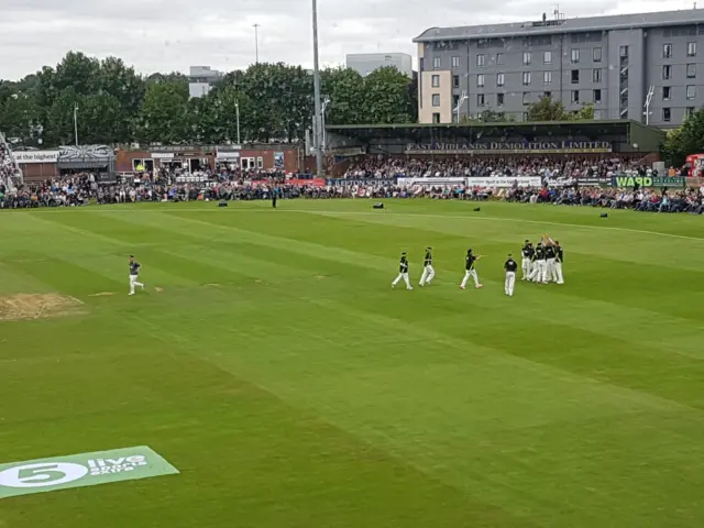 The TMS side celebrate