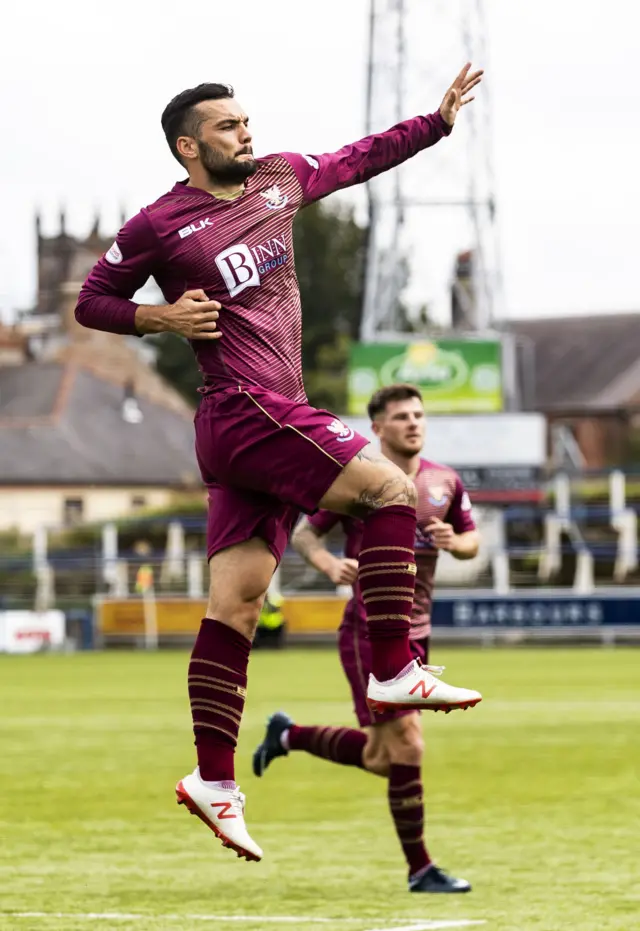 Tony Watt celebrates opening the scoring