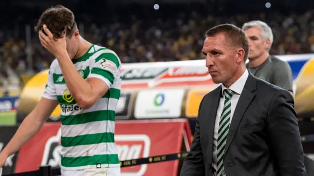 Celtic's Jack Hendry and Brendan Rodgers are left disappointed in Athens