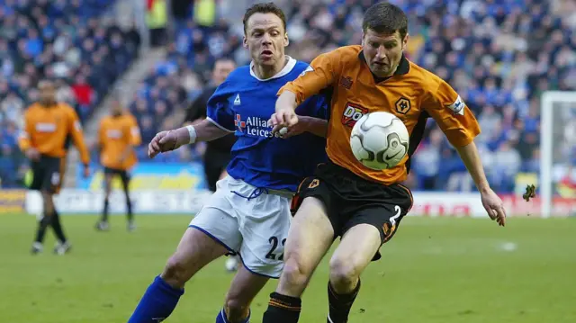 Dennis Irwin and Paul Dickov during Leicester v Wolves in 2004