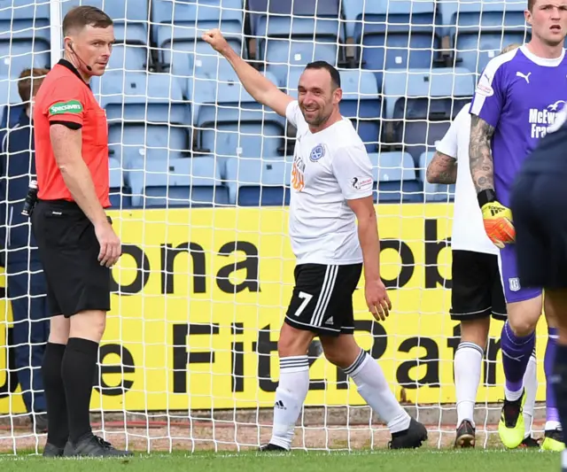 Michael Moffat celebrates his goal