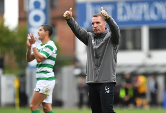 Celtic manager Brendan Rodgers greets his club's fans