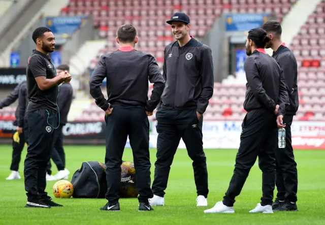 Kyle Lafferty (centre) takes in the East End Park surroundings