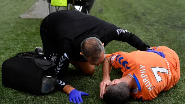 Jamie Murphy was stretchered off after a fall on the Rugby Park pitch.