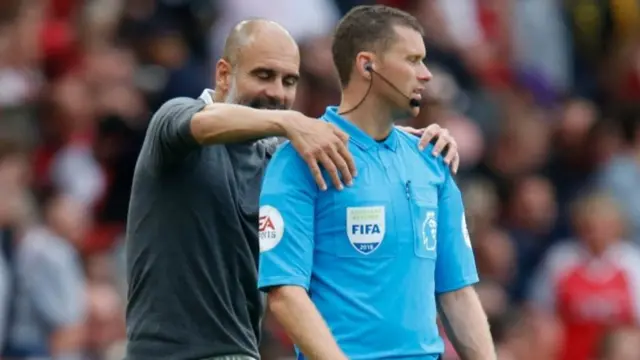 Pep Guardiola (left)