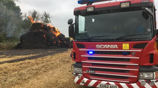 A haystack on fire in Lenham, near Maidstone