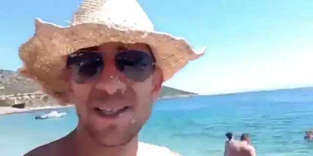 A still of Adam Catzavelos