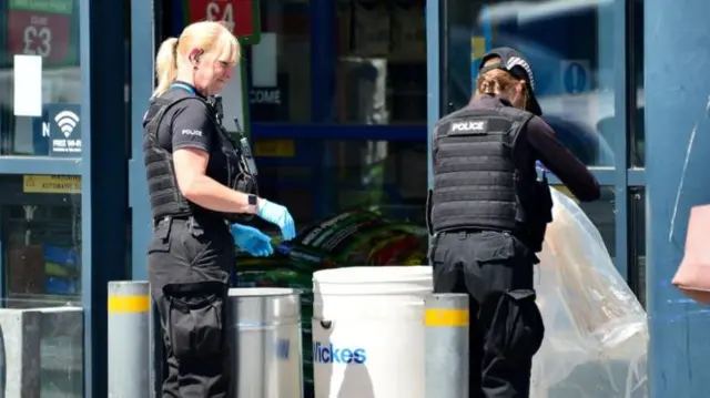 Police at the Home Bargains store in Worcester