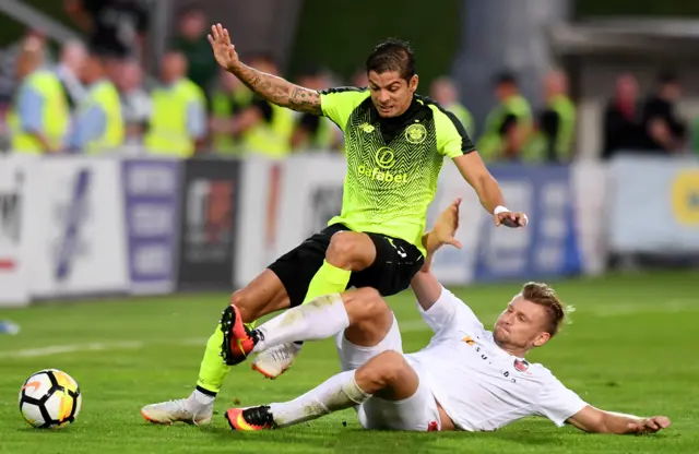 Celtic's Cristian Gamboa is tackled by Robertas Vezevicius