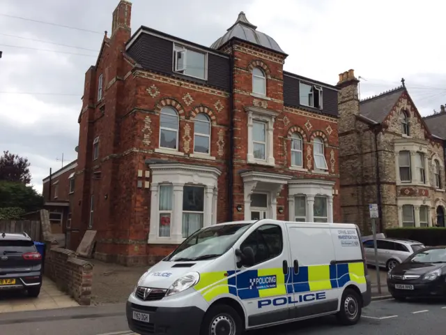 Police van outside flats in Bridlington