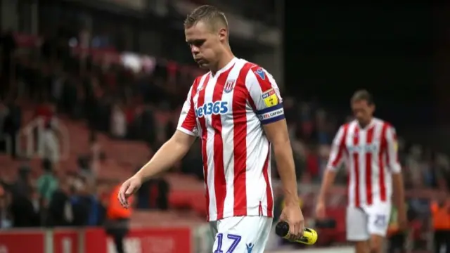 Stoke City skipper Ryan Shawcross looking dejected after Wigan defeat