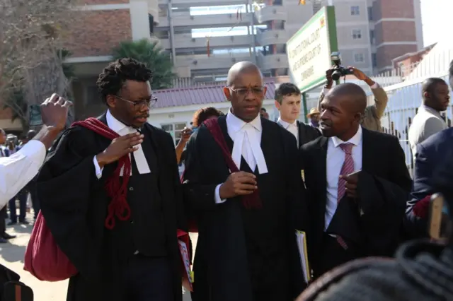 Lawyers representing the oppostion Movement For Democratic Change (MDC) Alliance leader Nelson Chamisa arrive at the Constitutional Court building in Harare, Zimbabwe, 22 August 2018.