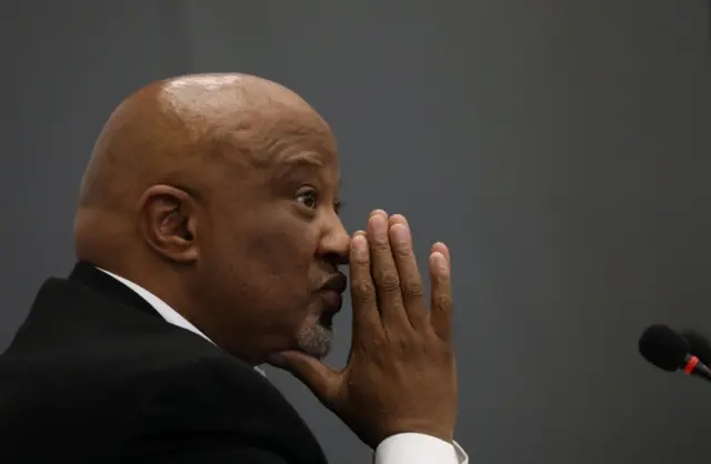 Mcebisi Jonas gestures ahead of the Judicial Commission of Inquiry probing state capture in Johannesburg, South Africa August 24, 2018.