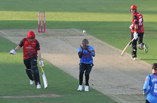 Ryan Davies of Durham (R) is caught and Bowled by Jofra Archer of Sussex