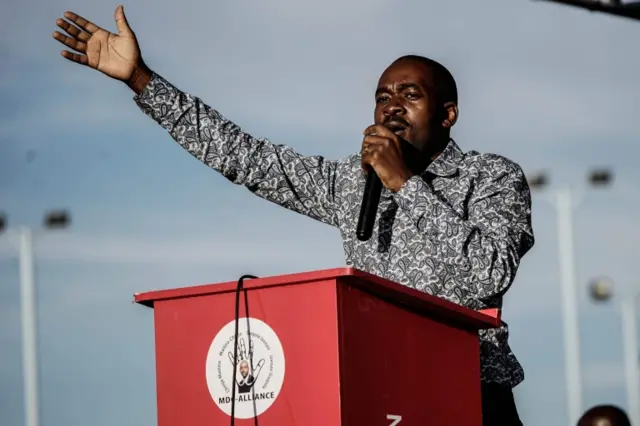 In this file photo taken on July 21, 2018 Zimbabwe main opposition party Movement for Democratic Change Alliance leader Nelson Chamisa gestures as he addresses a crowd of supporters during an election campaign rally at White City stadium in Bulawayo, Zimbabwe